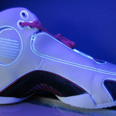 On The Low  The circular panel near the ankle of the Jordan 21 has a special “glow-in-the-dark” message that can only be seen under black light.